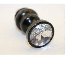 Черная фигурная анальная пробка с прозрачным кристаллом - 7,3 см.