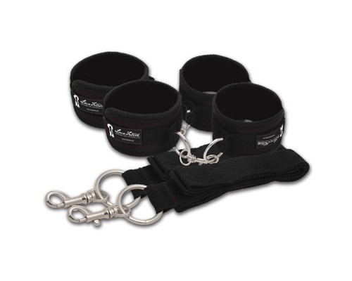 Две пары черных наручников, крепящиеся к матрасу